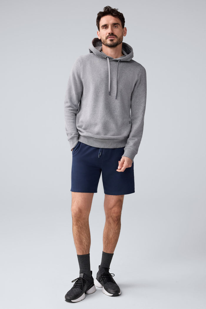 Full view of a man wearing ACE Sweatshort 7” in Total Eclipse