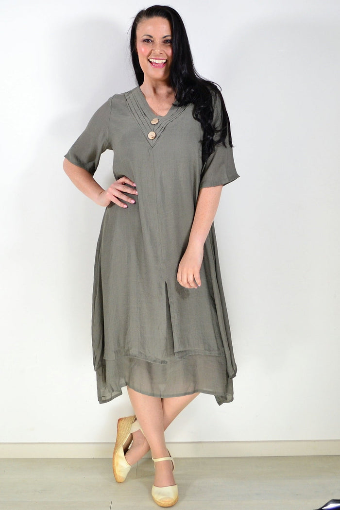 Khaki green La Mode summer tunic dress with short sleeves and relaxed fit, displayed on a hanger against a neutral background.