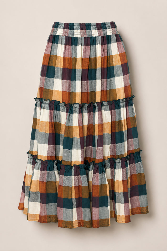 The Madeline Skirt in Maize Gingham by Ivy City Co features a long, tiered silhouette with ruffled seams, an elastic waistband, and convenient pockets. Crafted from a soft cotton-blend for all-day comfort, its plaid pattern combines shades of green, mustard yellow, rust, white, and mauve for a charming touch.