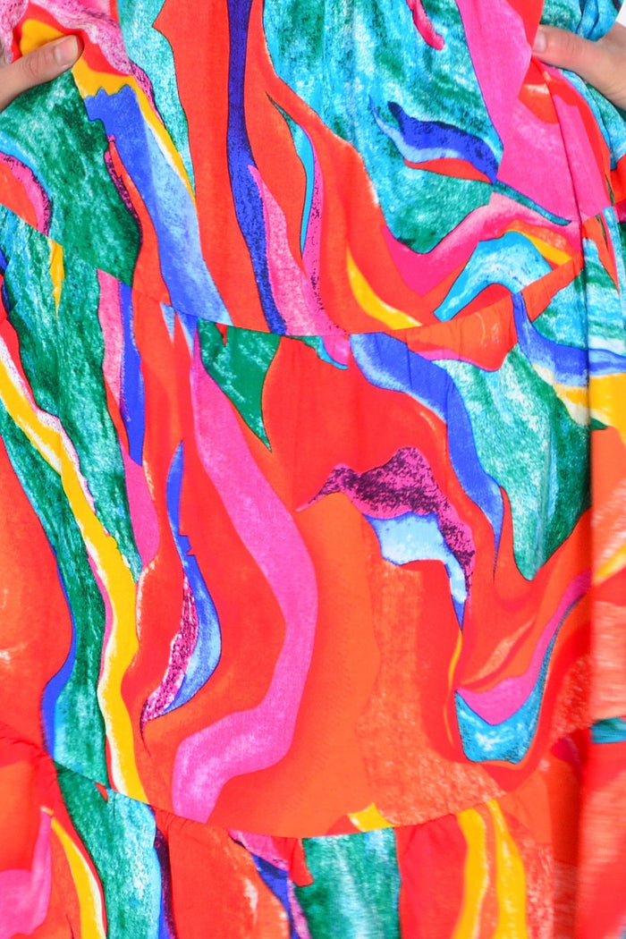 Orange and pink printed tunic dress by Hourglass, featuring a flowy design and vibrant pattern, perfect for casual or semi-formal wear.