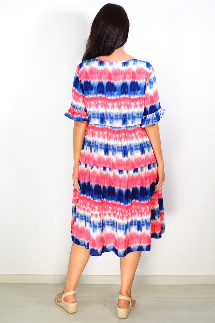 Pink and blue tie dye tunic dress by Hourglass featuring a relaxed fit and vibrant, swirling dye patterns.
