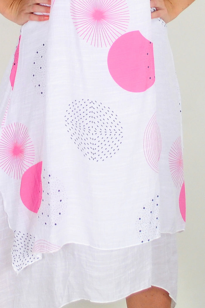 Pink spot sleeveless tunic dress from La Mode featuring a relaxed fit and casual style, displayed on a mannequin.