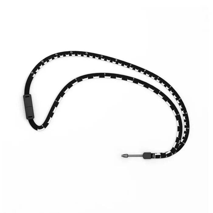 Detachable lanyard for a Silva Expedition compass showing the scale markers