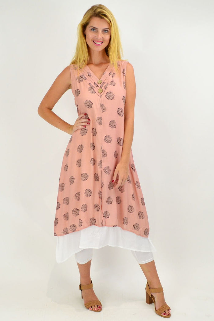 Sleeveless dusty pink dots overlay tunic dress by La Mode, shown with a relaxed fit and floral pattern on lightweight fabric.