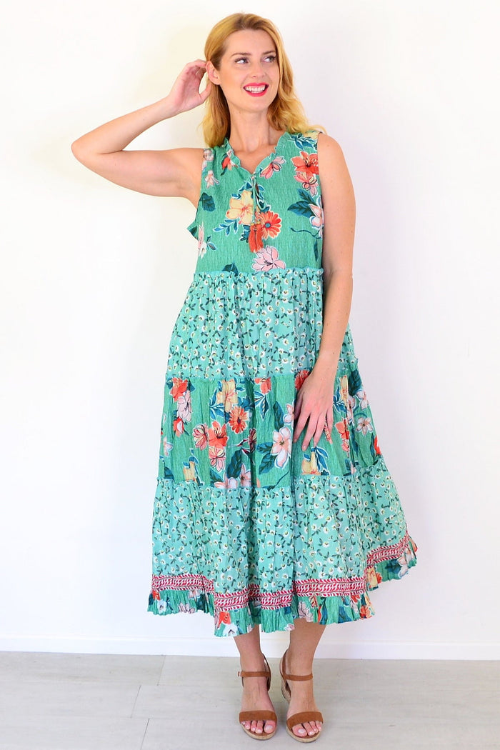 Orientique Sleeveless Kaleici Floral Tunic dress with vibrant botanical print, lightweight fabric, and relaxed fit.