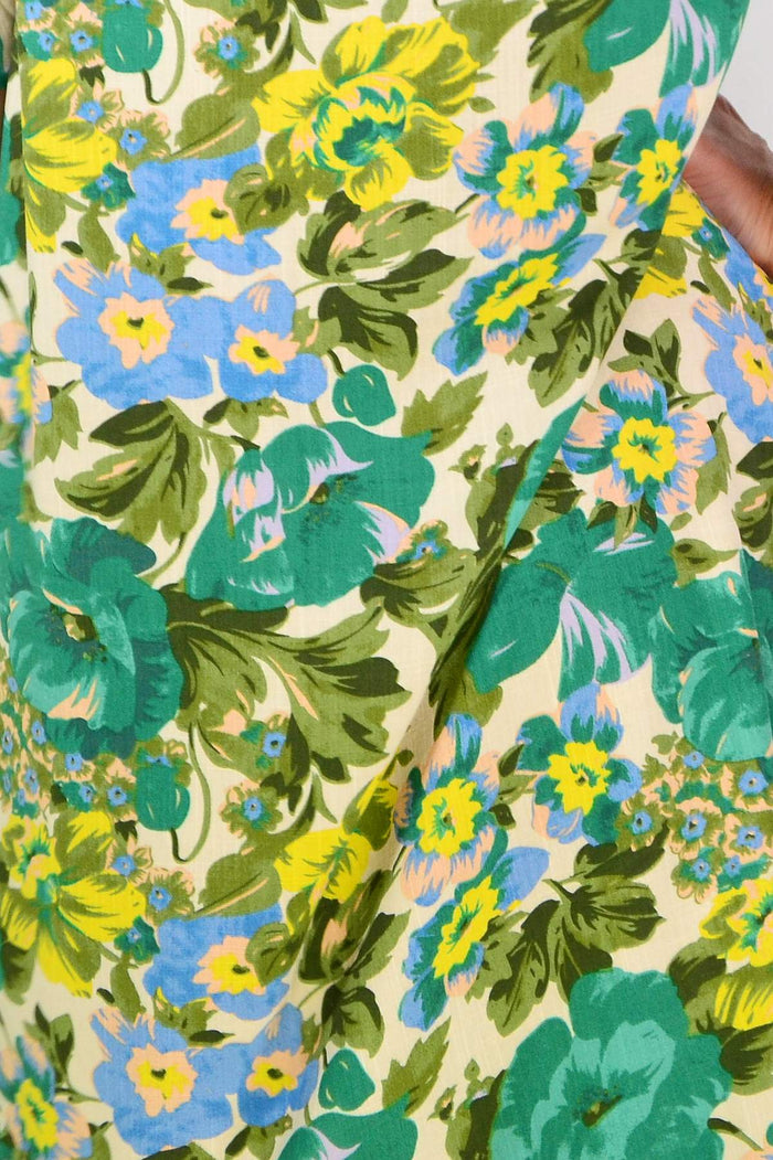 Green Summer Delight Tunic Dress by Hourglass, lightweight fabric with short sleeves and a relaxed fit, perfect for warm weather.