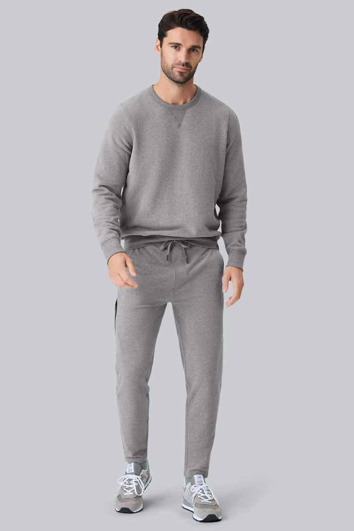 Full Front view of a man wearing ACE Crew Neck Sweatshirt in Grey Heather