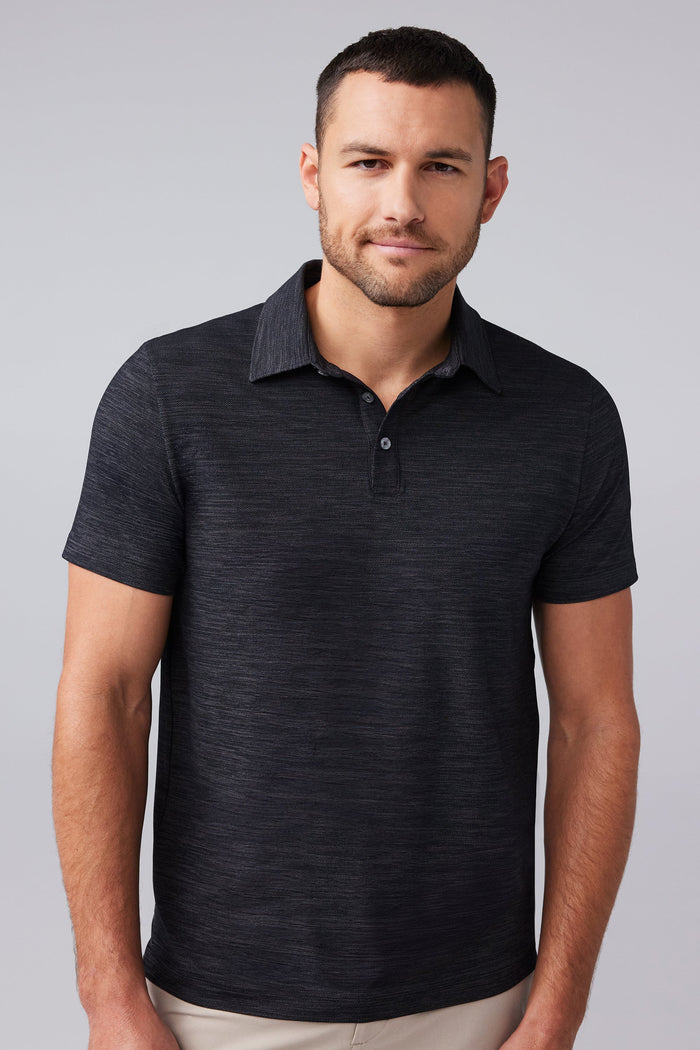 Front view of man wearing AIRKNITˣ Polo in Anthracite Gargoyle