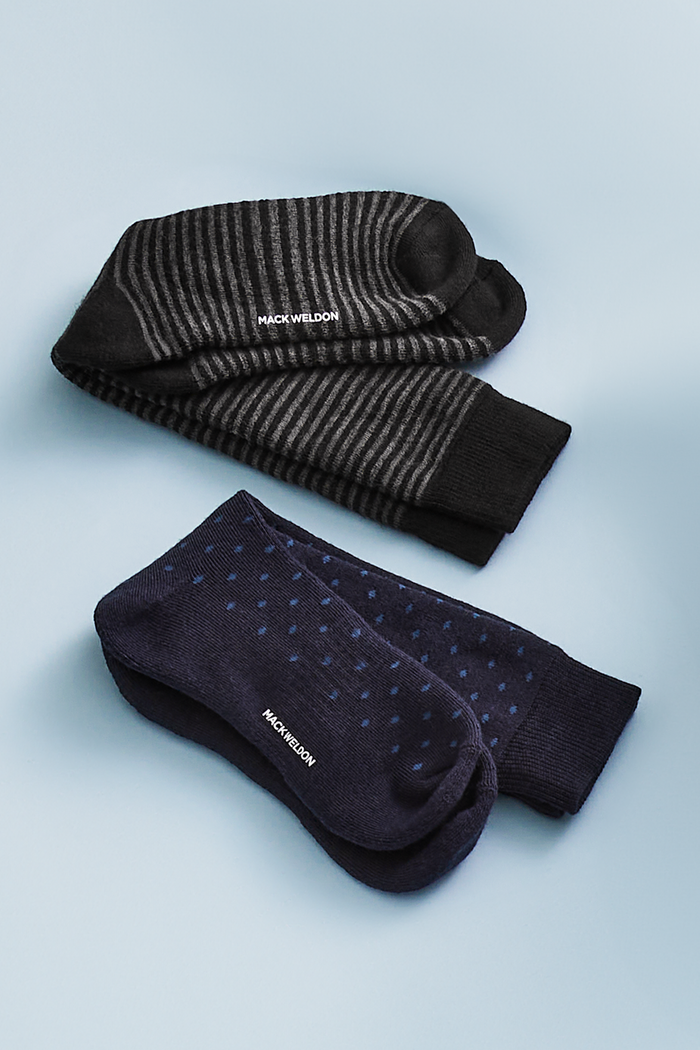 Close up view of True Black Charcoal Stripe and True Navy Dot Tech Merino Extended Crew Sock