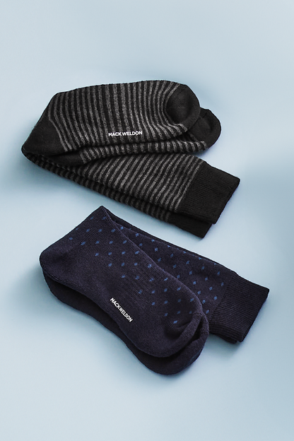 Close up view of True Black Charcoal Stripe and True Navy Dot Tech Merino Extended Crew Sock