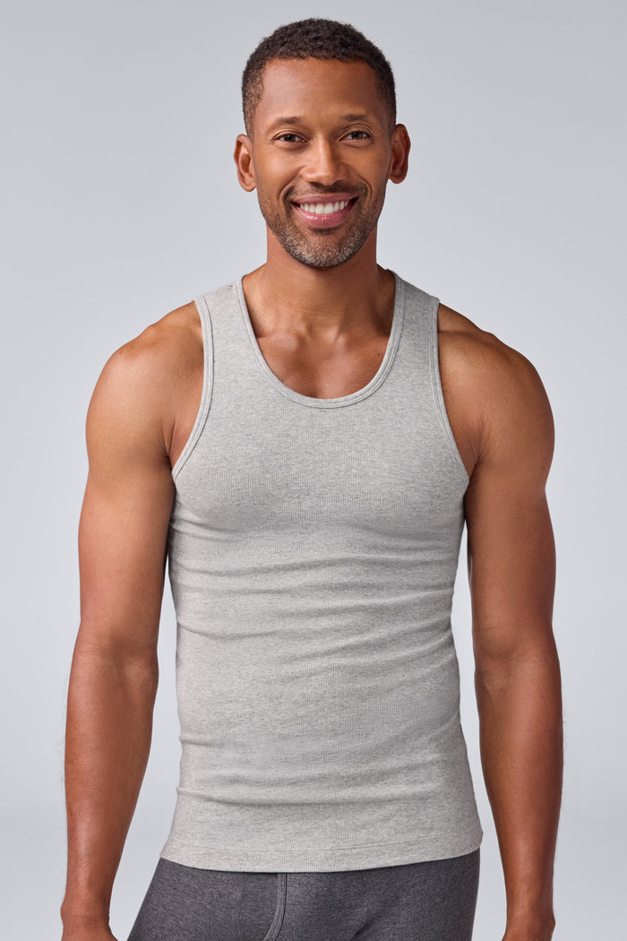 Front view of a man wearing 18-Hour Rib Tank in Grey Heather
