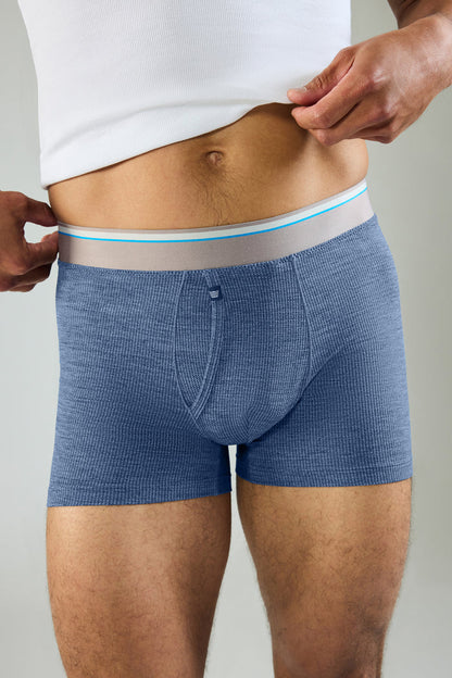Front view of a man wearing Airknitx Boxer Brief w/ Fly in Indigo Heather