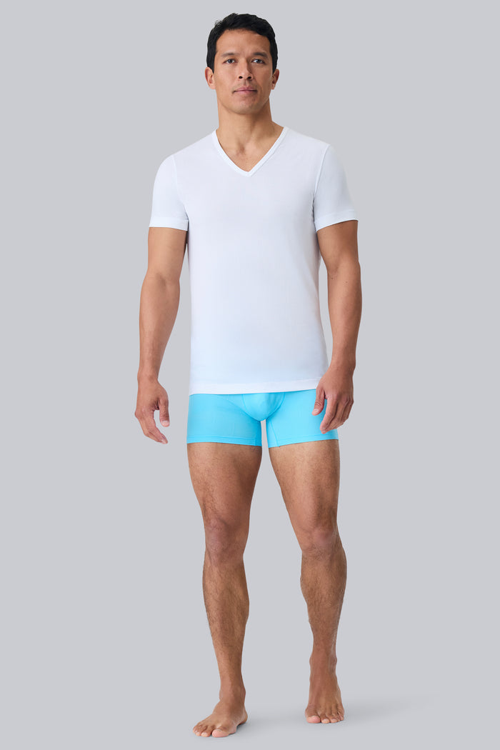 Full front view of a man wearing AIRKNITˣ V-Neck Undershirt in Bright White