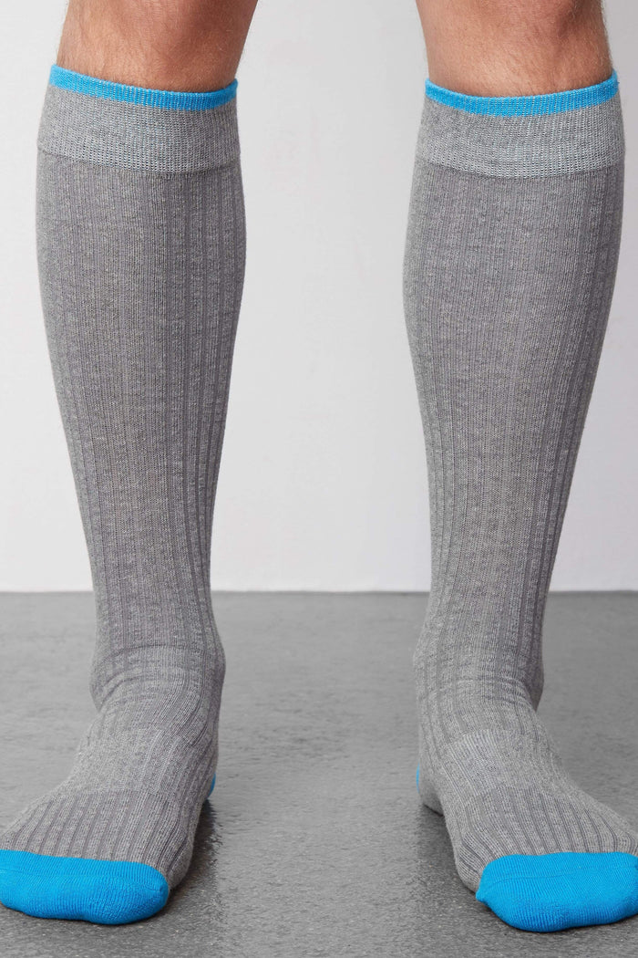 Front view of a man wearing Everyday Extended Crew Sock in Grey Heather