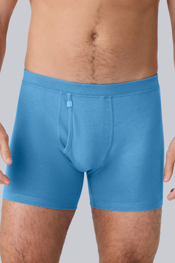 Front view of a man wearing Silver Boxer Brief in Dean Blue