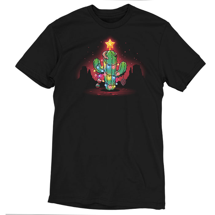 Premium Cotton T-shirt_TeeTurtle A Desert Christmas Black apparel featuring an artistic cactus with lights, ornaments, a star, and a gecko on top in front of a grand canyon inspired silhouetted background.