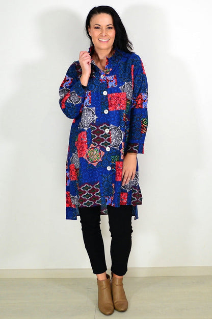 Abstract navy tunic shirt by Wishstone, featuring a stylish design and comfortable fit, displayed on a hanger against a plain background.