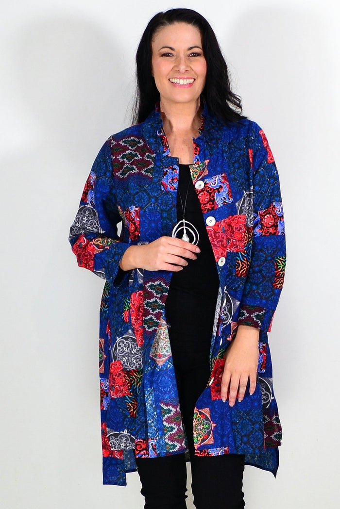 Abstract navy tunic shirt by Wishstone, featuring a relaxed fit and stylish design, displayed on a hanger.