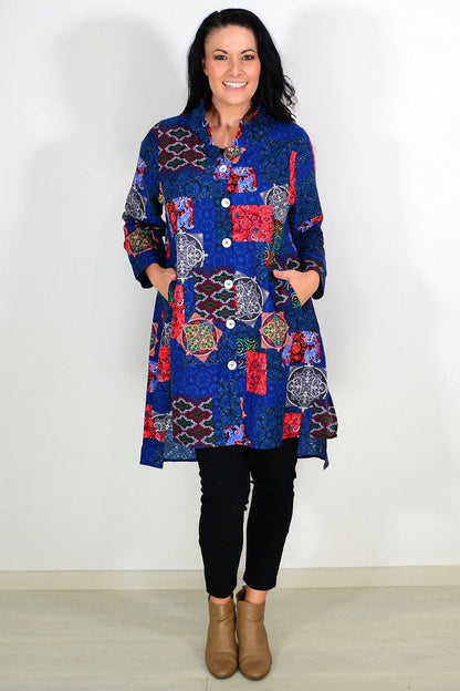 Abstract navy tunic shirt by Wishstone, featuring a relaxed fit and stylish design, displayed on a hanger.