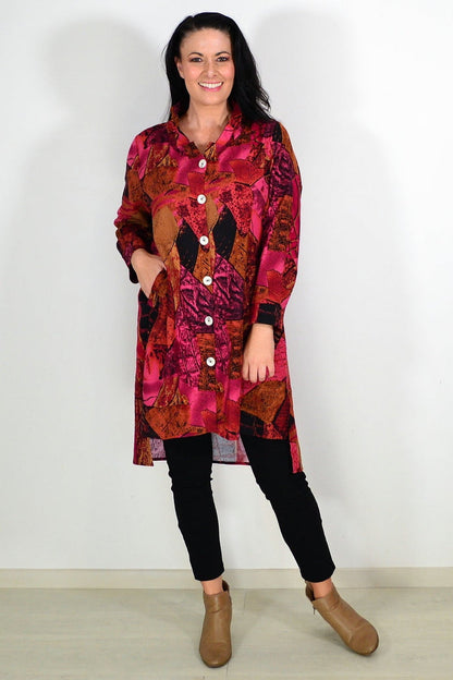 Abstract pink and mustard woven tunic shirt from Wishstone, featuring a relaxed fit and stylish design.