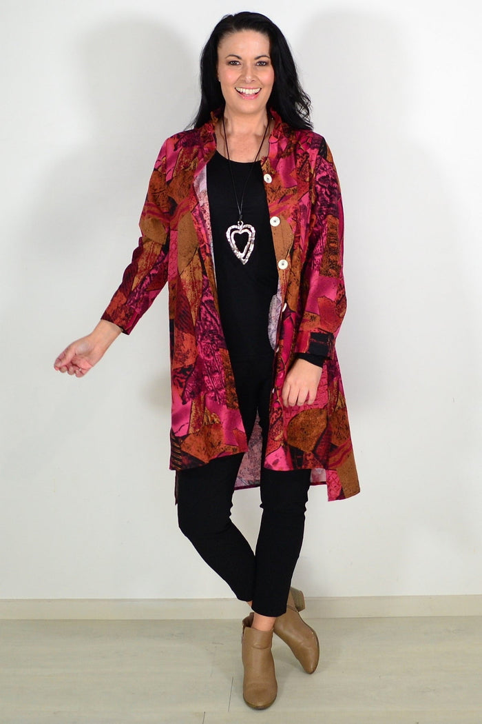 Abstract pink and mustard wishstone tunic shirt with long sleeves, casual and stylish for everyday wear.