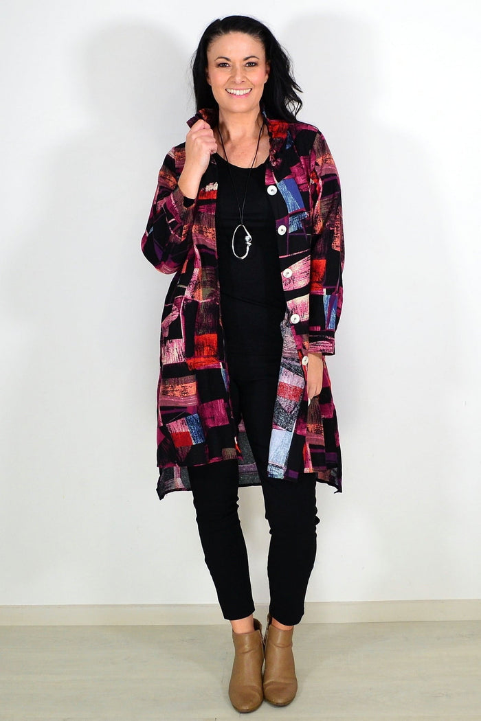 Abstract pink Wishstone tunic shirt with a relaxed fit, featuring a stylish abstract pattern, perfect for casual and chic looks.