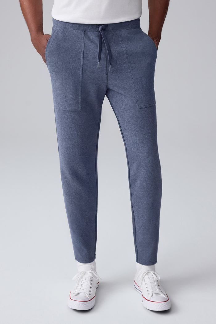 Front view of a man wearing Ace Carpenter Sweatpant in Navy Heather