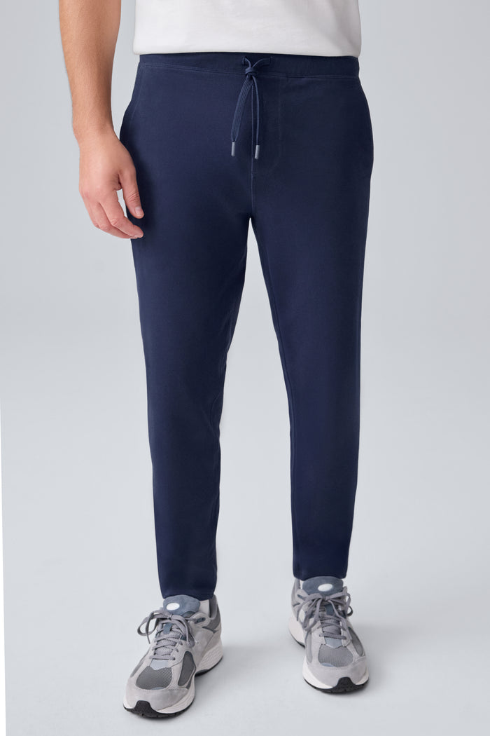 Front view of a man wearing Ace Sweatpant in Total Eclipse