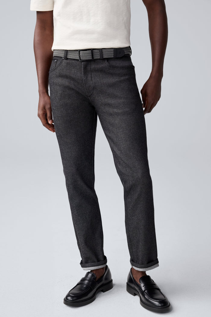 Full view of a man wearing Admiral Braided Belt in True Black / Steel