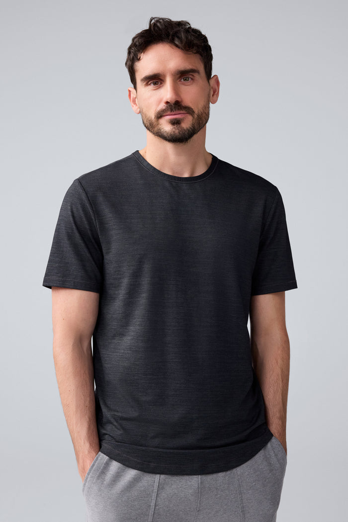Front view of a man wearing AIRKNITx Crew Neck T-Shirt in Anthracite