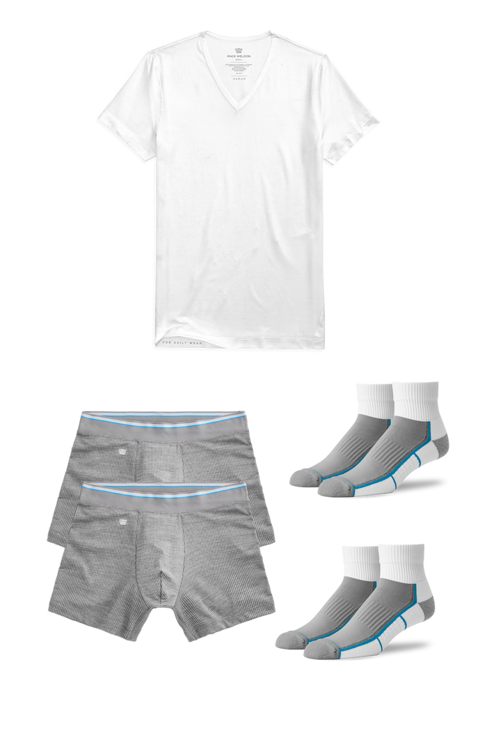 Laydown of AIRKNITx Essentials Pack that includeds: Two pairs of AIRKNITx Boxer Briefs, One AIRKNITx V-Neck Undershirt and Two pairs of AIRKNITx High Ankle Socks