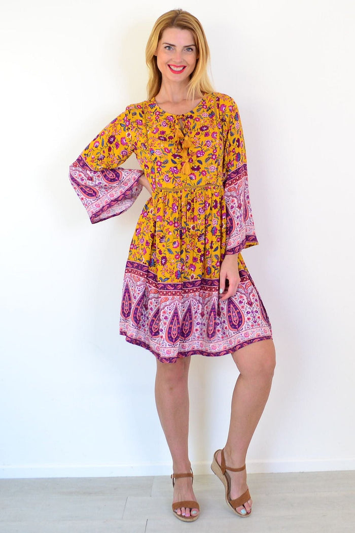 Dream Amelia Mustard Bohemian Tunic Dress with relaxed fit, featuring boho patterns and flowing fabric, styled for casual wear.