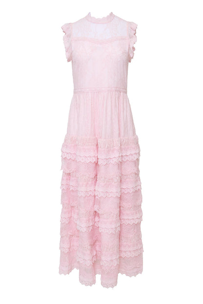 Pink lace dress against a white background