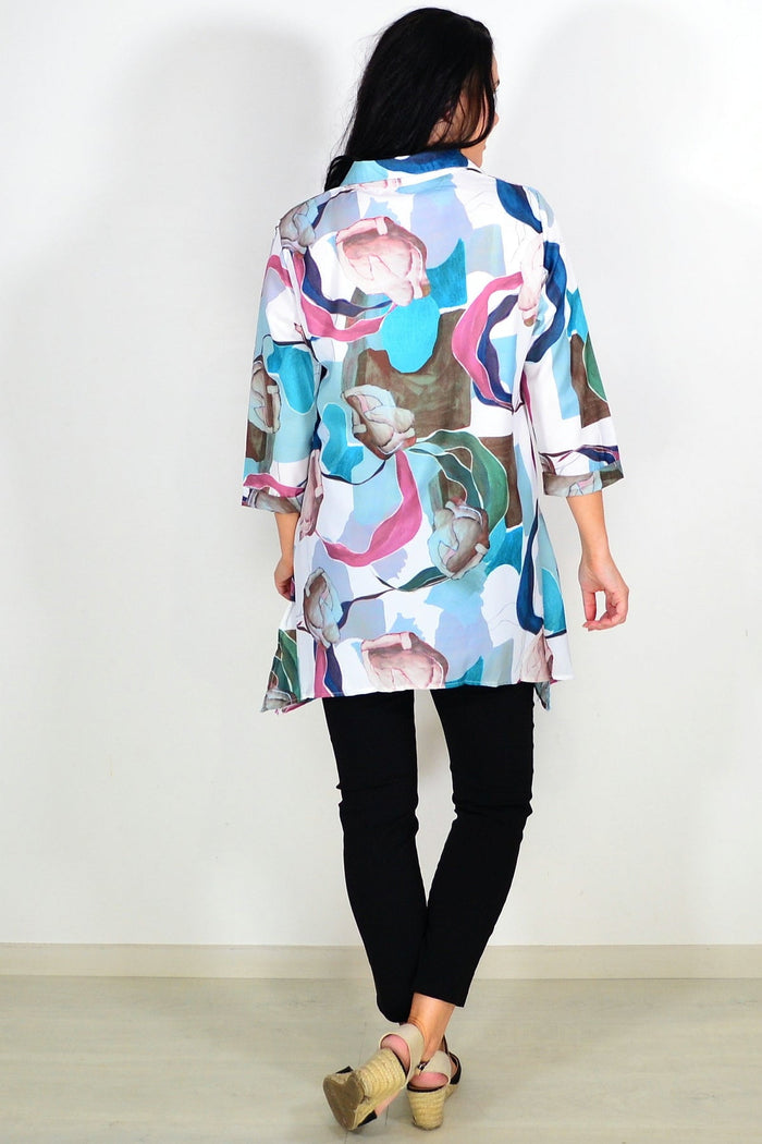 Wishstone Aqua Artwork Swirls Tunic Shirt with vibrant blue and white swirl pattern, lightweight and comfortable for casual wear.