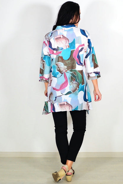 Wishstone Aqua Artwork Swirls Tunic Shirt with vibrant blue and white swirl pattern, lightweight and comfortable for casual wear.