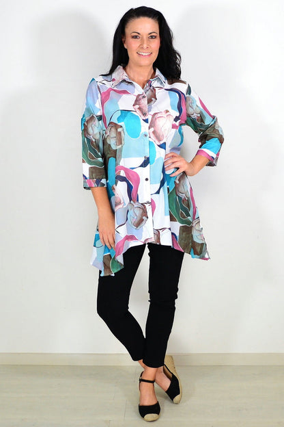 Wishstone Aqua Artwork Swirls Tunic Shirt featuring vibrant swirl designs and a flowing, comfortable fit for casual wear.