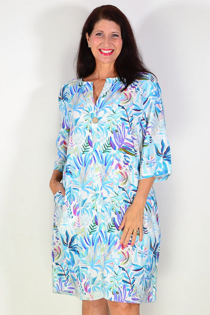 Aqua blue floral linen blend tunic from La Mode, featuring a relaxed fit with a vibrant floral pattern and lightweight fabric.