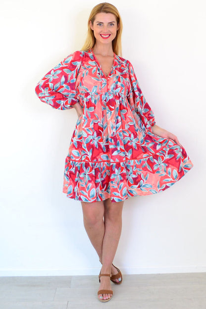 Dream Aqua Coral Floral Bohemian Tunic dress with vibrant floral patterns and flowing fabric, perfect for casual summer wear.