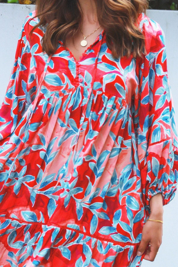 Dream Aqua Coral Floral Bohemian Tunic dress with vibrant floral patterns and flowy fabric, perfect for casual or beach wear.
