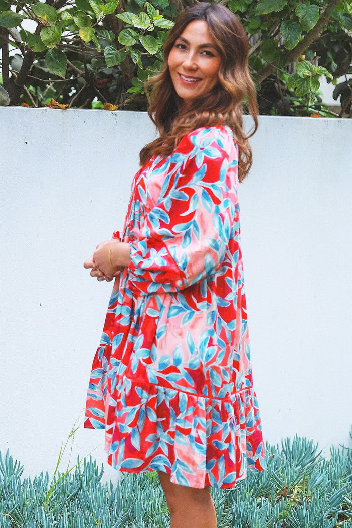 Dream Aqua Coral floral bohemian tunic dress with vibrant patterns and flowing fabric, perfect for casual summer wear.