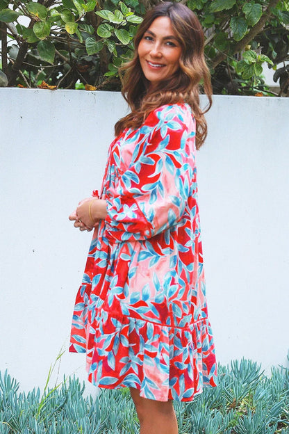 Dream Aqua Coral floral bohemian tunic dress with vibrant patterns and flowing fabric, perfect for casual summer wear.