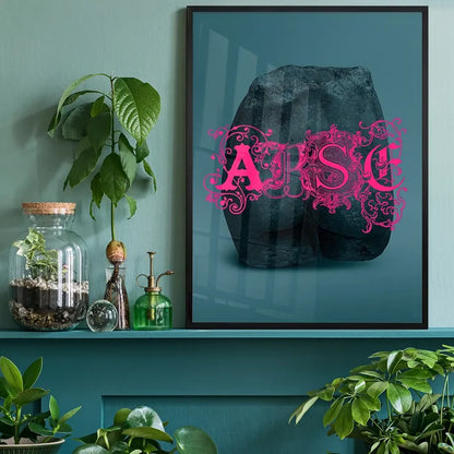 Arse Sculpture Pink Print, quirky altered art print black framed on a living room shelf