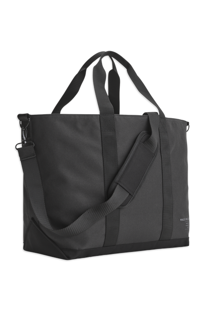 Front side view of the Atlas Tote showcasing the carrying handles and shoulder strap