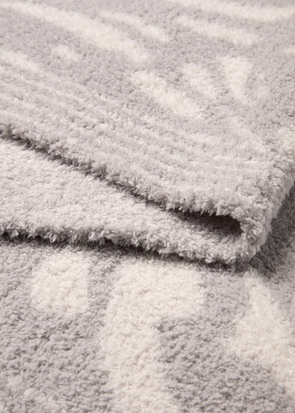 Grey and cream animal print blanket