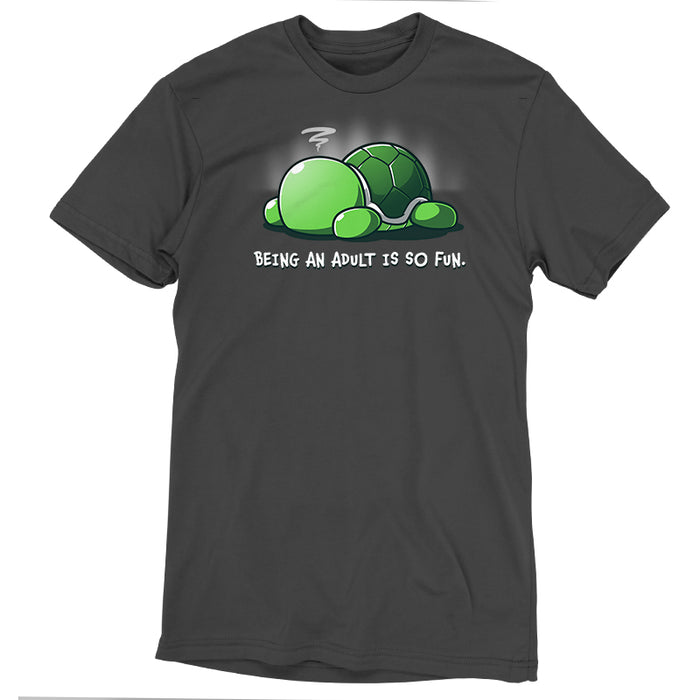 Premium Cotton T-shirt_TeeTurtle Being an Adult is So Fun Charcoal Gray t-shirt featuring a cartoon turtle lying face down with a stressed expression, accompanied by the text "Being an adult is so fun."