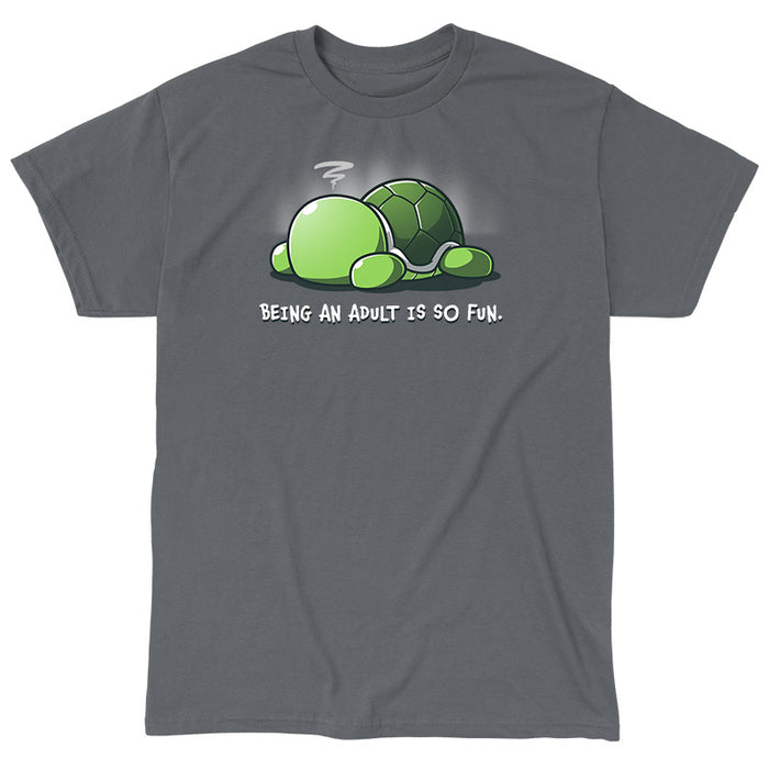 Classic Cotton T-shirt_TeeTurtle Being an Adult is So Fun Charcoal Gray t-shirt featuring a cartoon turtle lying face down with a stressed expression, accompanied by the text "Being an adult is so fun."