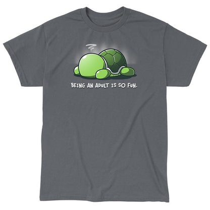 Classic Cotton T-shirt_TeeTurtle Being an Adult is So Fun Charcoal Gray t-shirt featuring a cartoon turtle lying face down with a stressed expression, accompanied by the text "Being an adult is so fun."
