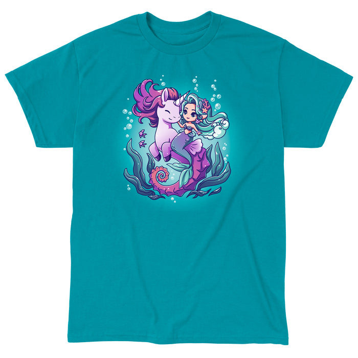 Classic Cotton T-shirt_Teeturtle BFFs (Sea Unicorn and Mermaid) tropical blue t-shirt featuring an illustrated image of a cheerful mermaid with teal hair riding a smiling purple unicorn underwater, surrounded by bubbles, fish, and sea plants.