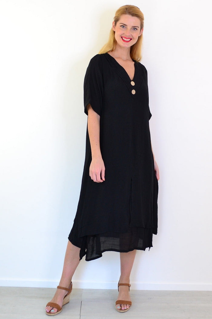 Black summer tunic dress by La Mode, flowing lightweight fabric with a relaxed fit and sleeveless design, perfect for warm weather.