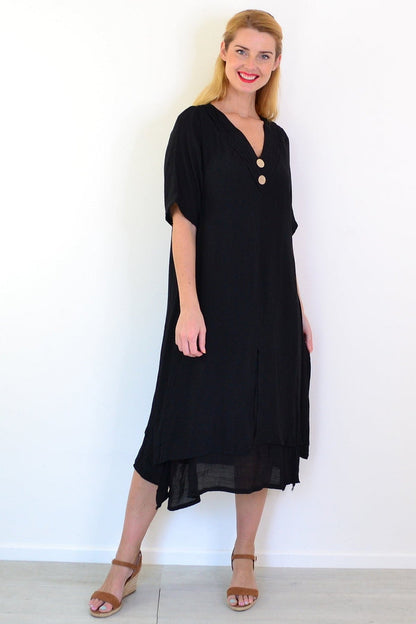 Black summer tunic dress by La Mode, flowing lightweight fabric with a relaxed fit and sleeveless design, perfect for warm weather.